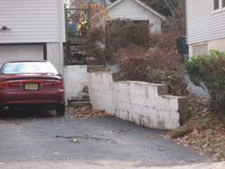 leaning retaining wall safety hazard